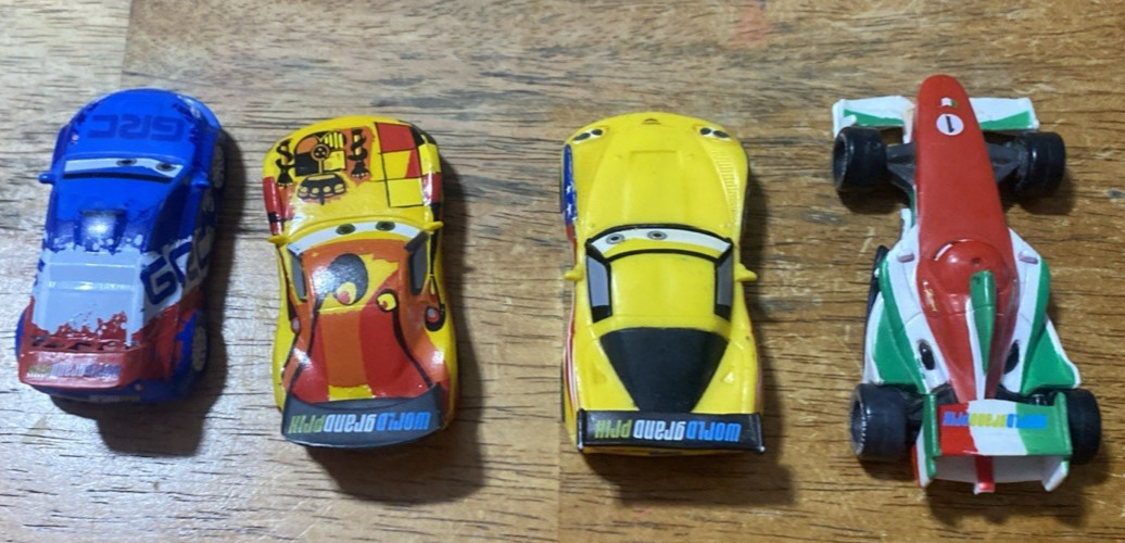 Lot Of 4 Disney Pixar Cars 2 Plastic PVC Vehicles Cake Toppers