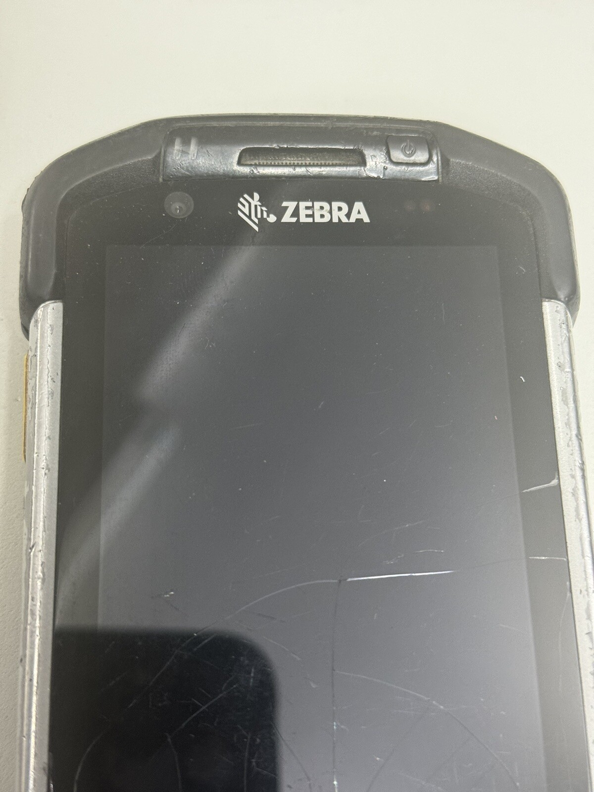 FedEx Or USPS Dispatchers / Mgmt with damaged Zerba TC-77 scanner screen repair.